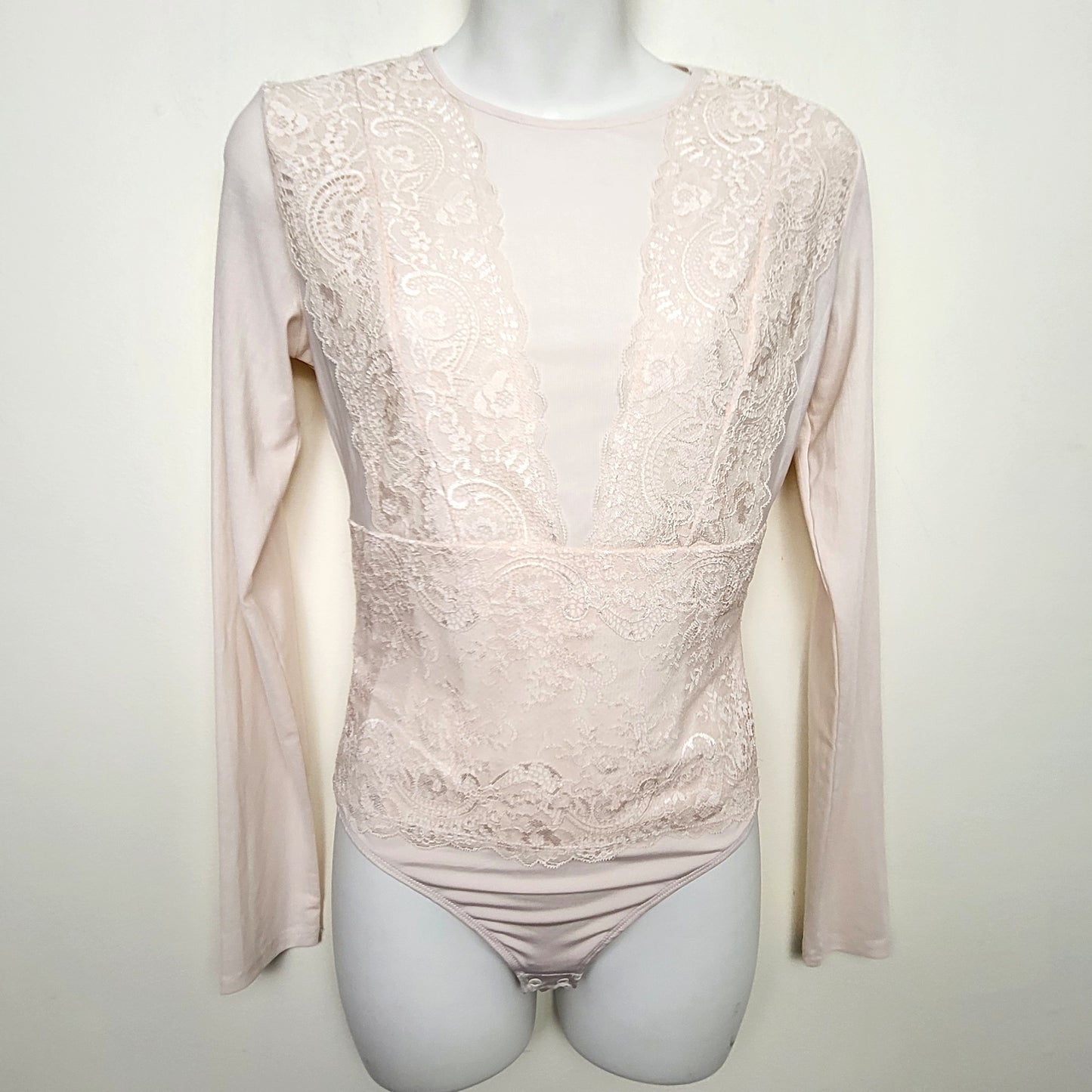 CMCRD2 - Pale pink lacey bodysuit with cut-out at back. Approx size small