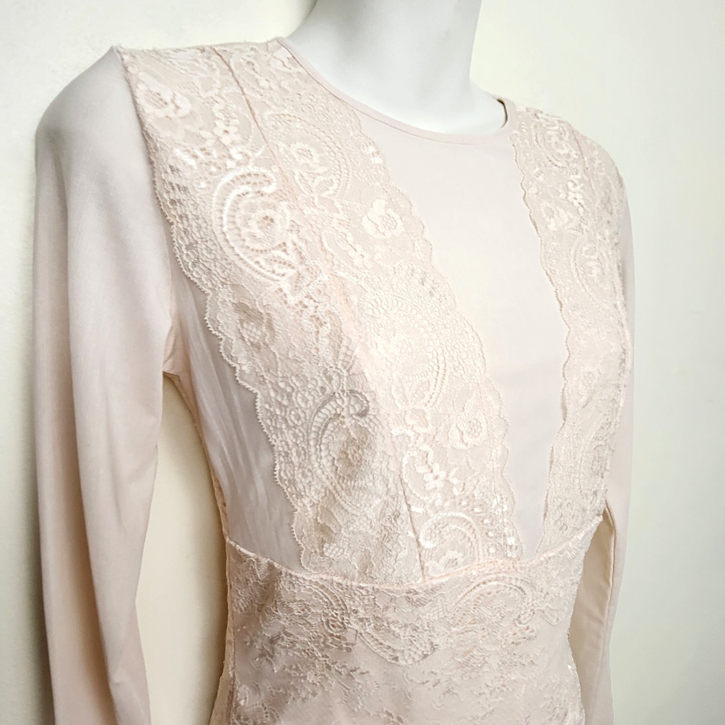 CMCRD2 - Pale pink lacey bodysuit with cut-out at back. Approx size small