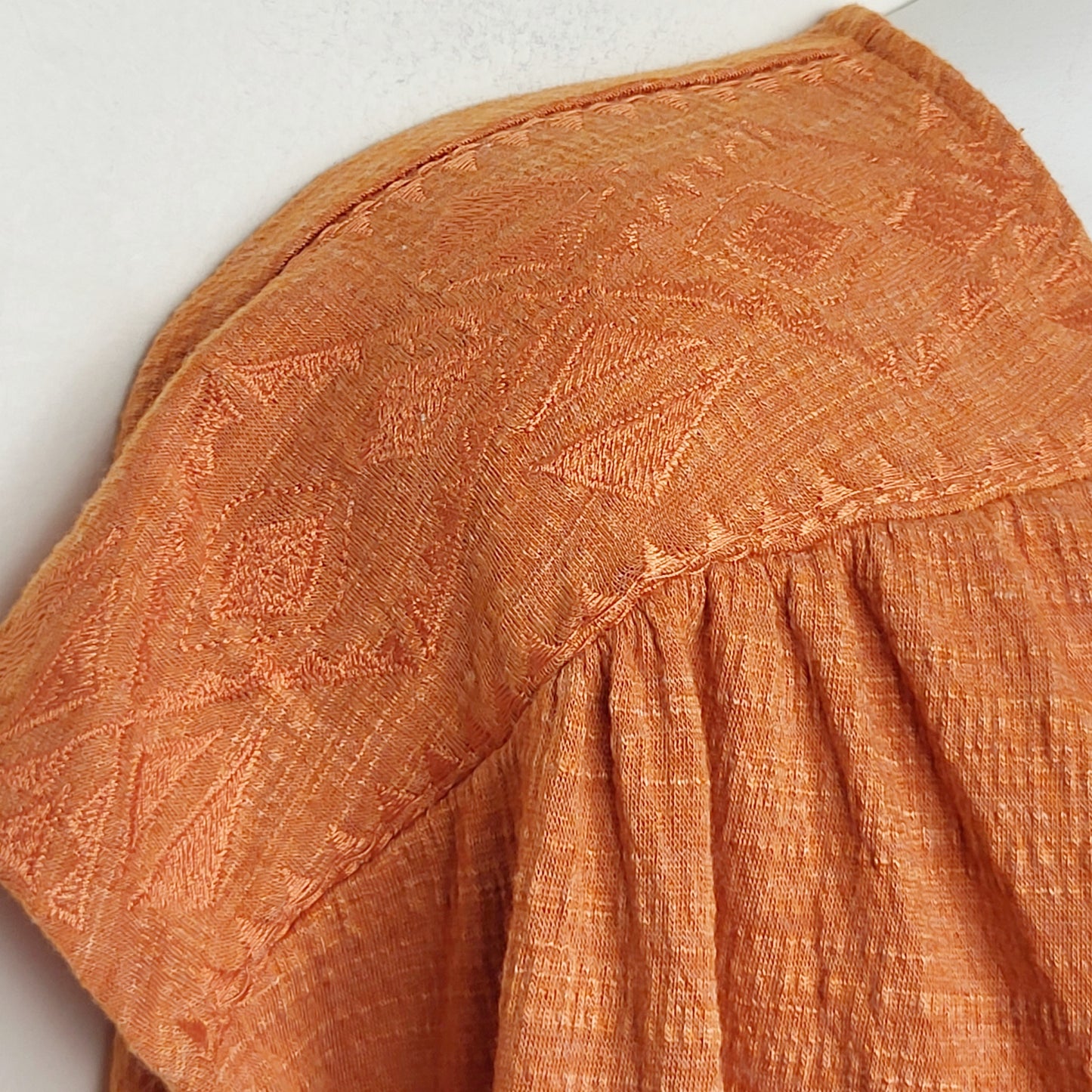 MFAIR1 - Cable and Gauge orange suprlice tee with embroidered details. Size large
