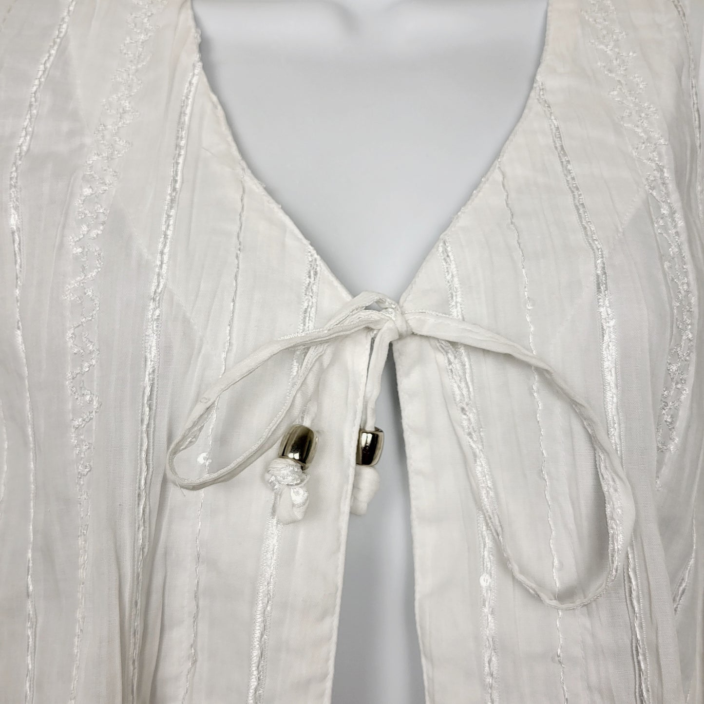 JUDR1 - Silhouette Solution white front tie gauzy top with texture and beading. Size small
