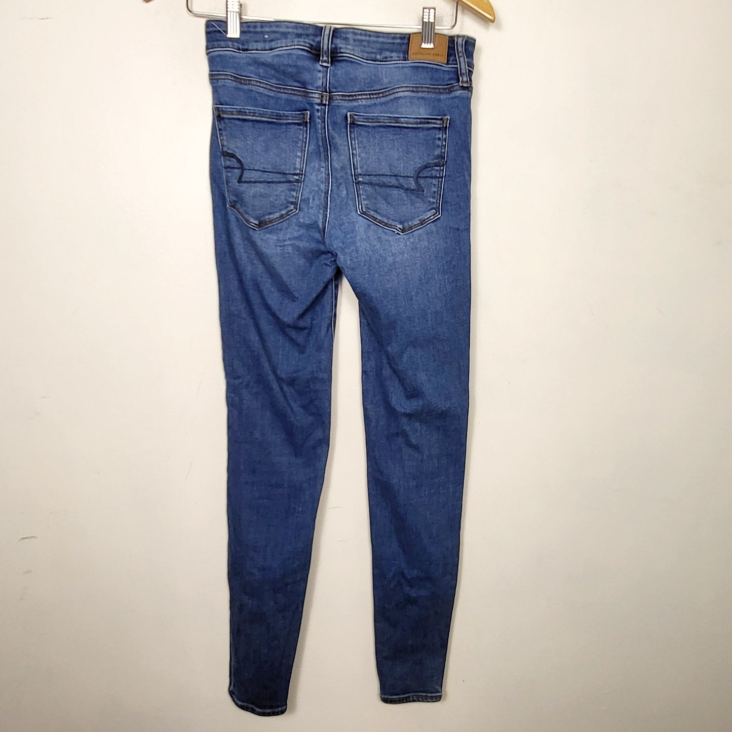 MVLK - American Eagle medium wash high rise jeggings. Size 4