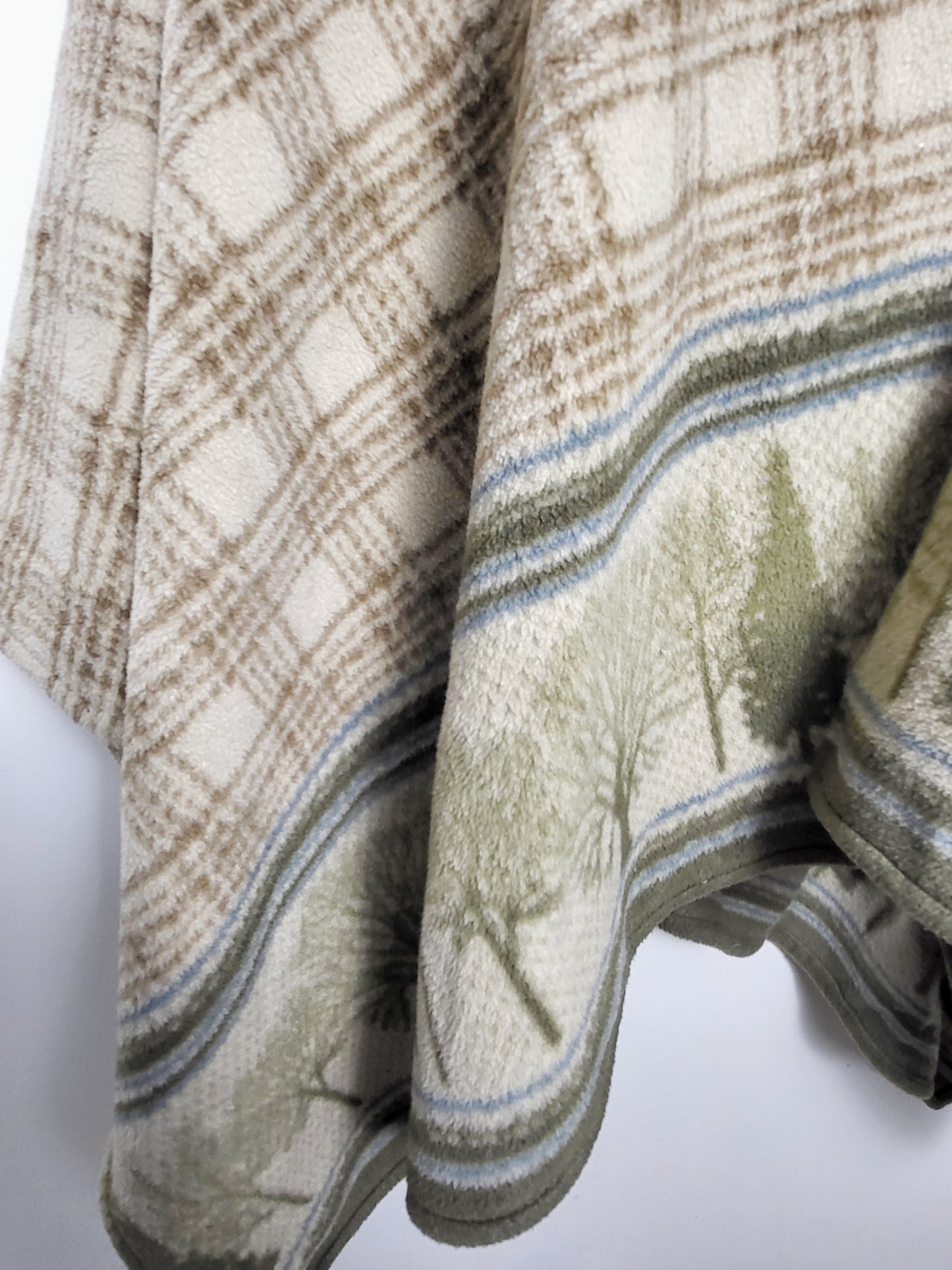 AGLL2 - Plaid fleece blanket poncho with forest trim. One size fits all