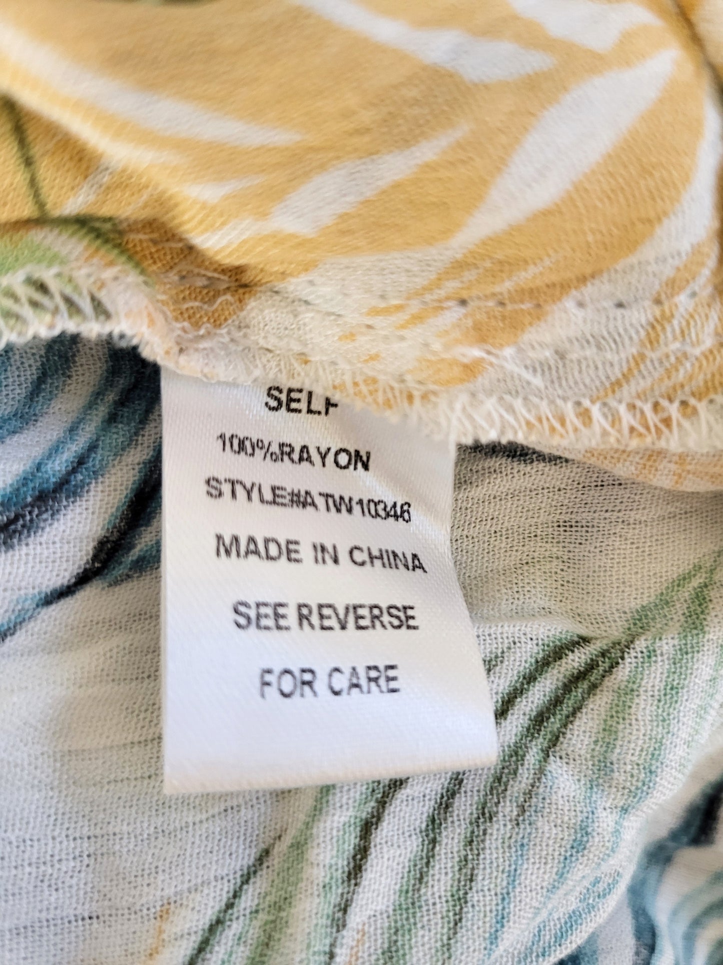 Andthewhy leaf printed knotted rayon top. Size small