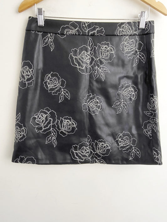 RW and Co. black floral embroidered faux leather mini skirt. Size 8