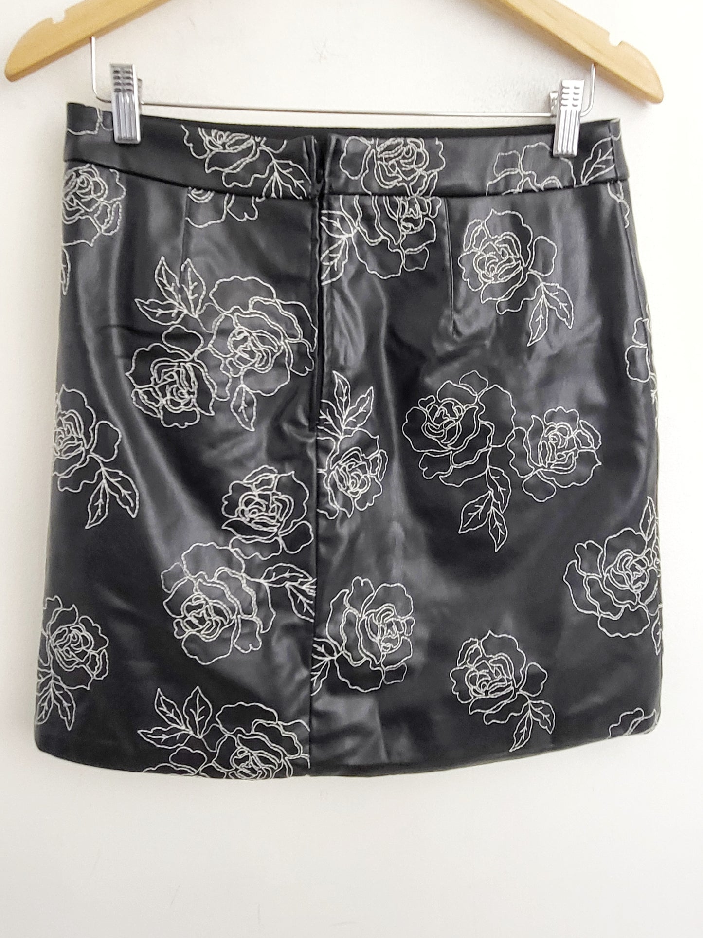 RW and Co. black floral embroidered faux leather mini skirt. Size 8