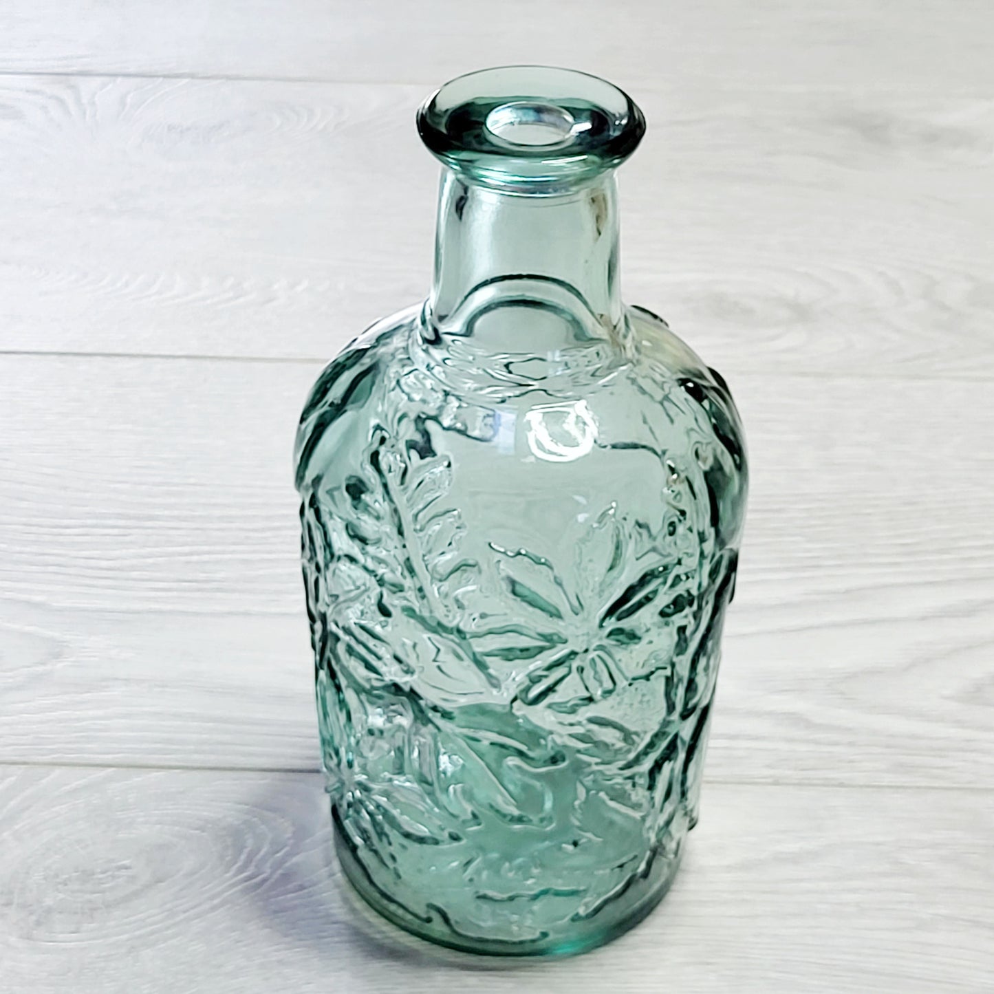Vintage light green wine decanter with maple leaves. Made in Canada