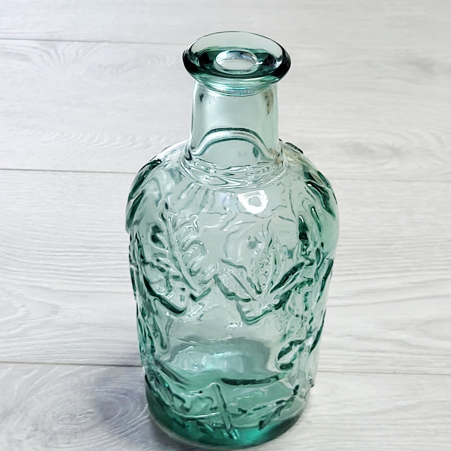 Vintage light green wine decanter with maple leaves. Made in Canada