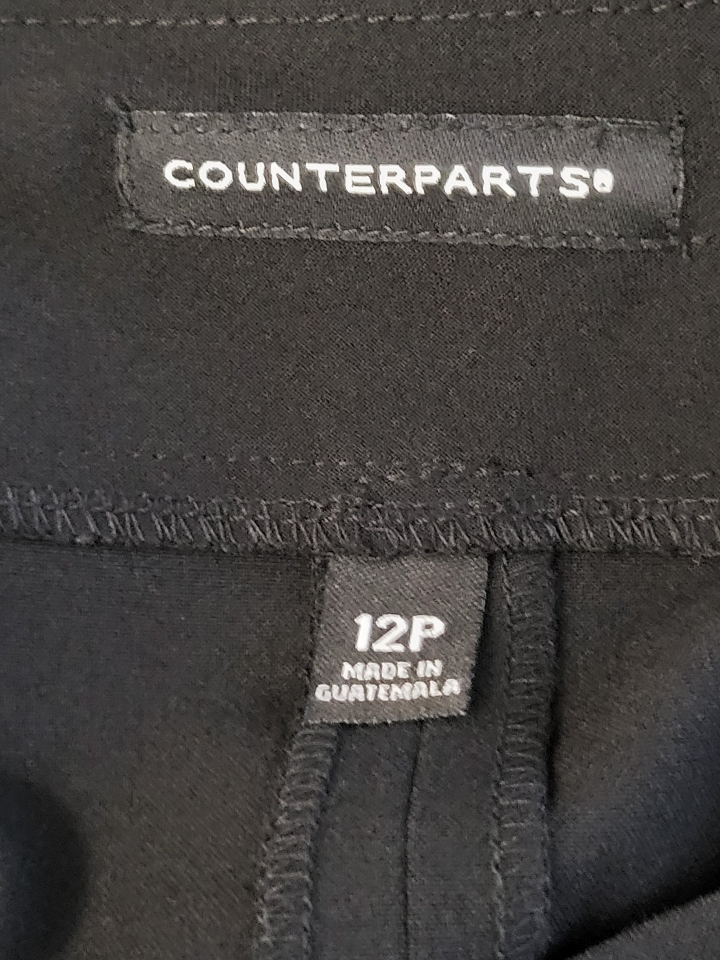 Counterparts black pull on knit skirt | Size 12 PETITE
