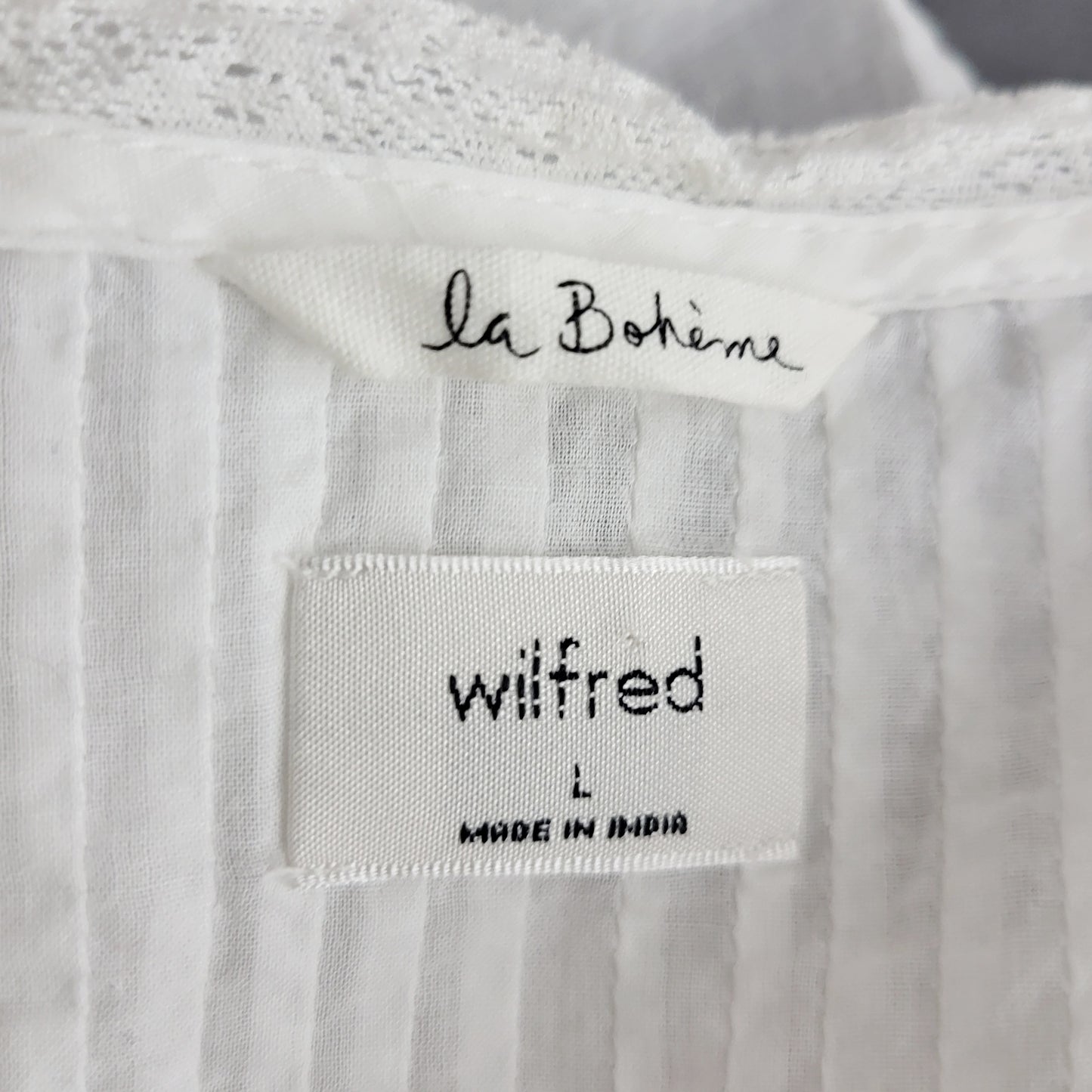 CHND2 - Aritzia Wilfred Delacroix La Boheme White Ruffle Sleeve Tie Top Tank, size large, good condition