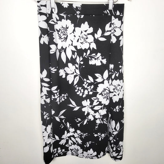 JLMB1 - Heimish black floral print midi skirt. Sizes like a small