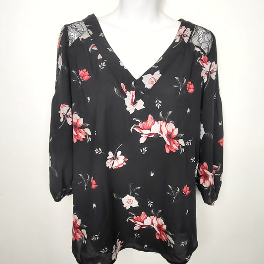 JLMB1 - Kismet black floral print loose fit long sleeved top. Size small