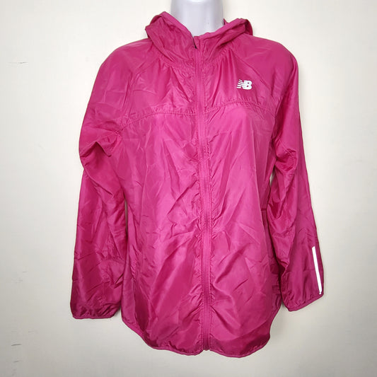 BBIN1 - New Balance pink hooded windbreaker with reflective strips. Size medium