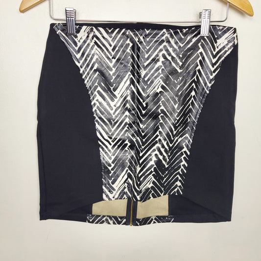 CSAL1 - Minkpink animal print mini skirt. Size medium