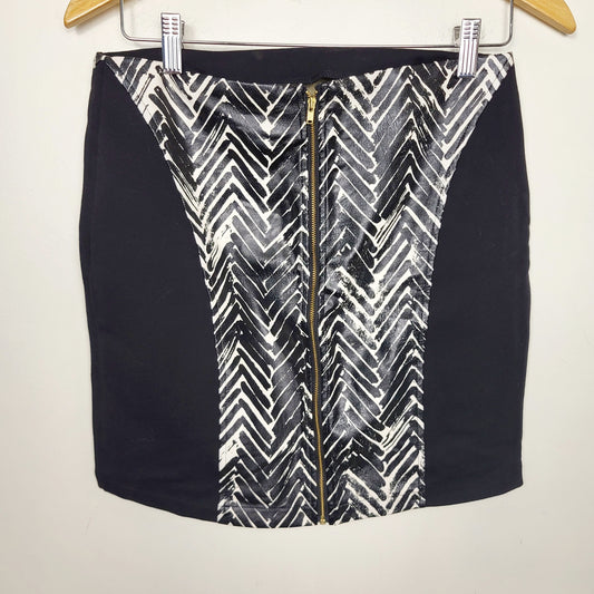 CSAL1 - Minkpink animal print mini skirt. Size medium