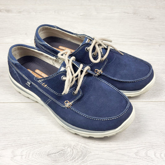 Skechers navy slip-on Tevin boat shoes. Men's size 9