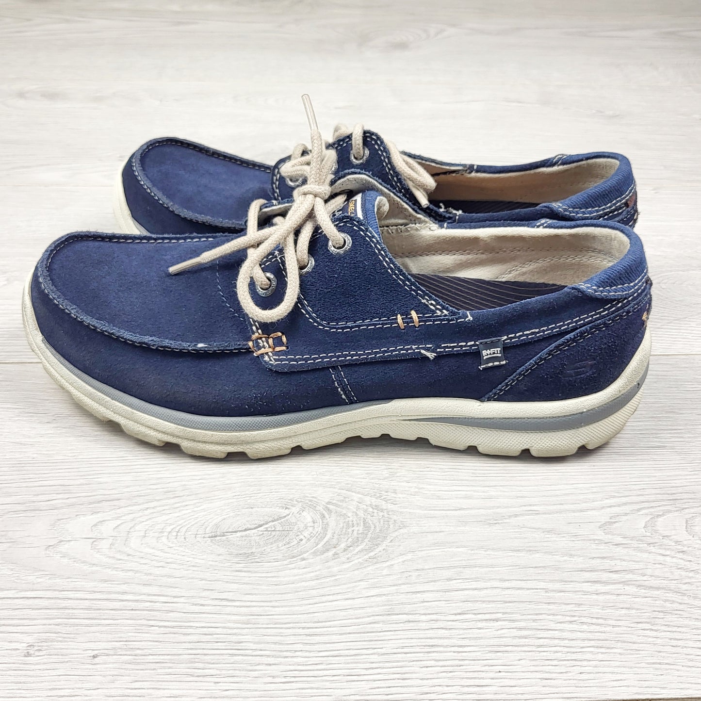 Skechers navy slip-on Tevin boat shoes. Men's size 9