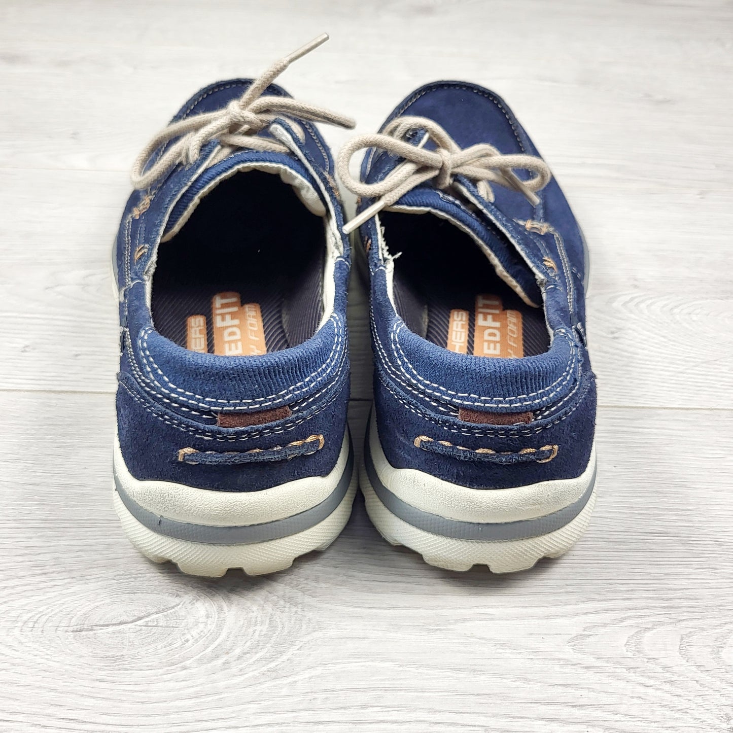 Skechers navy slip-on Tevin boat shoes. Men's size 9