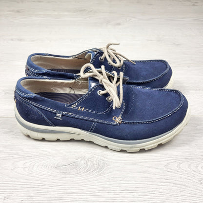Skechers navy slip-on Tevin boat shoes. Men's size 9