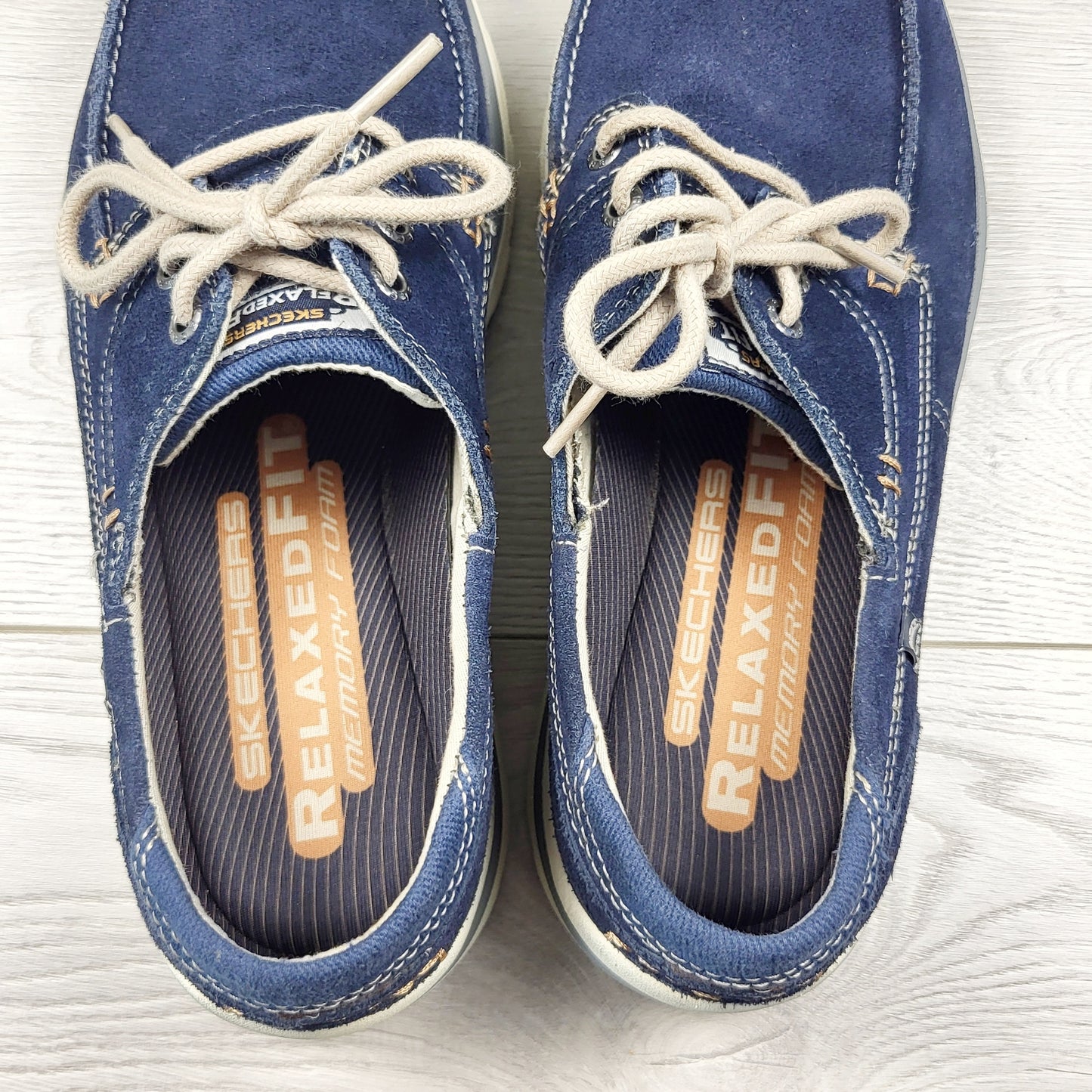 Skechers navy slip-on Tevin boat shoes. Men's size 9