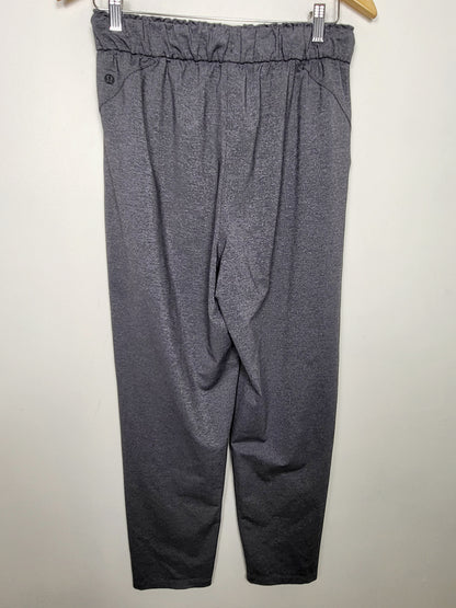 KLJ2 - Lululemon Keep Moving 7/8 Pant in Heathered Grey. Size 8