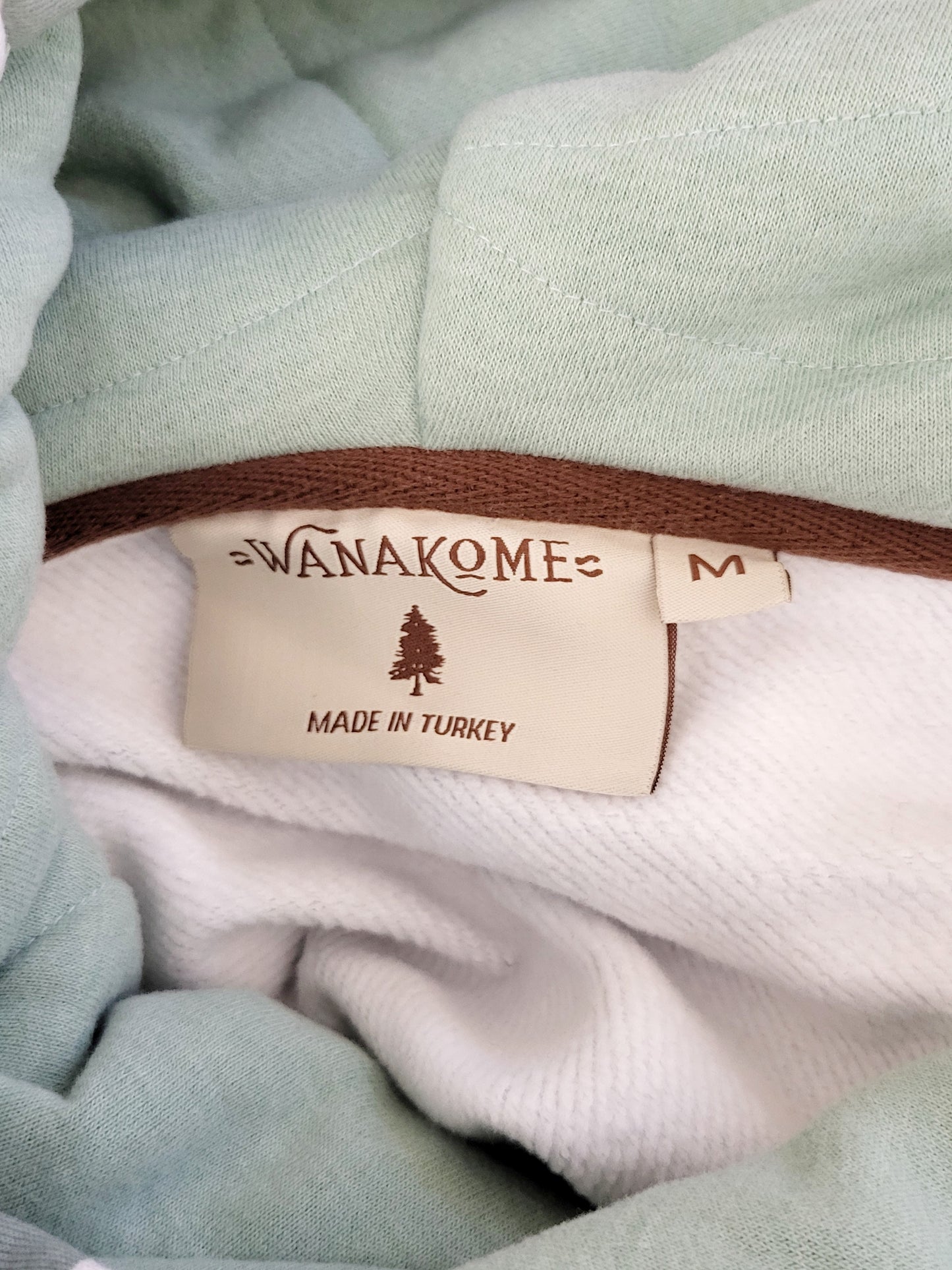 KHW1 - Wanakome Artemis hoodie in green bay striped pattern. Size medium