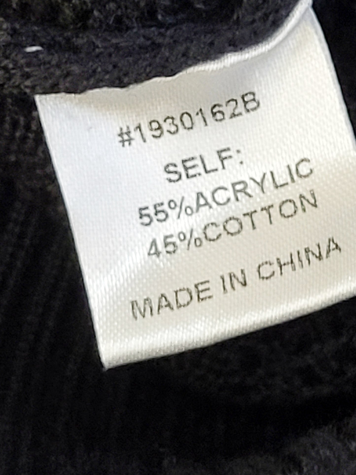 KHW2 - Bohme black open knit sweater with ruffles. Size large (measures as a medium)