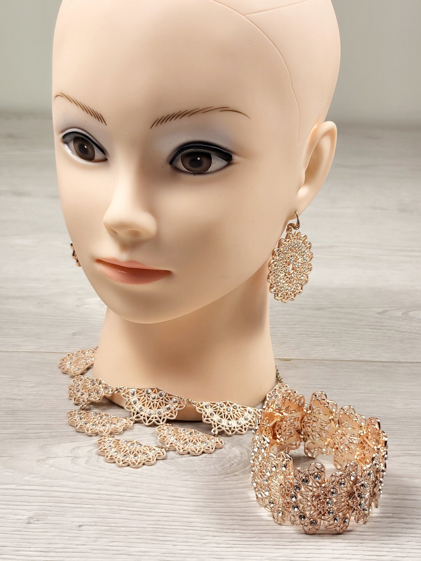 CHSP1 - I.N.C. rose gold toned crystal filigree jewelry set.