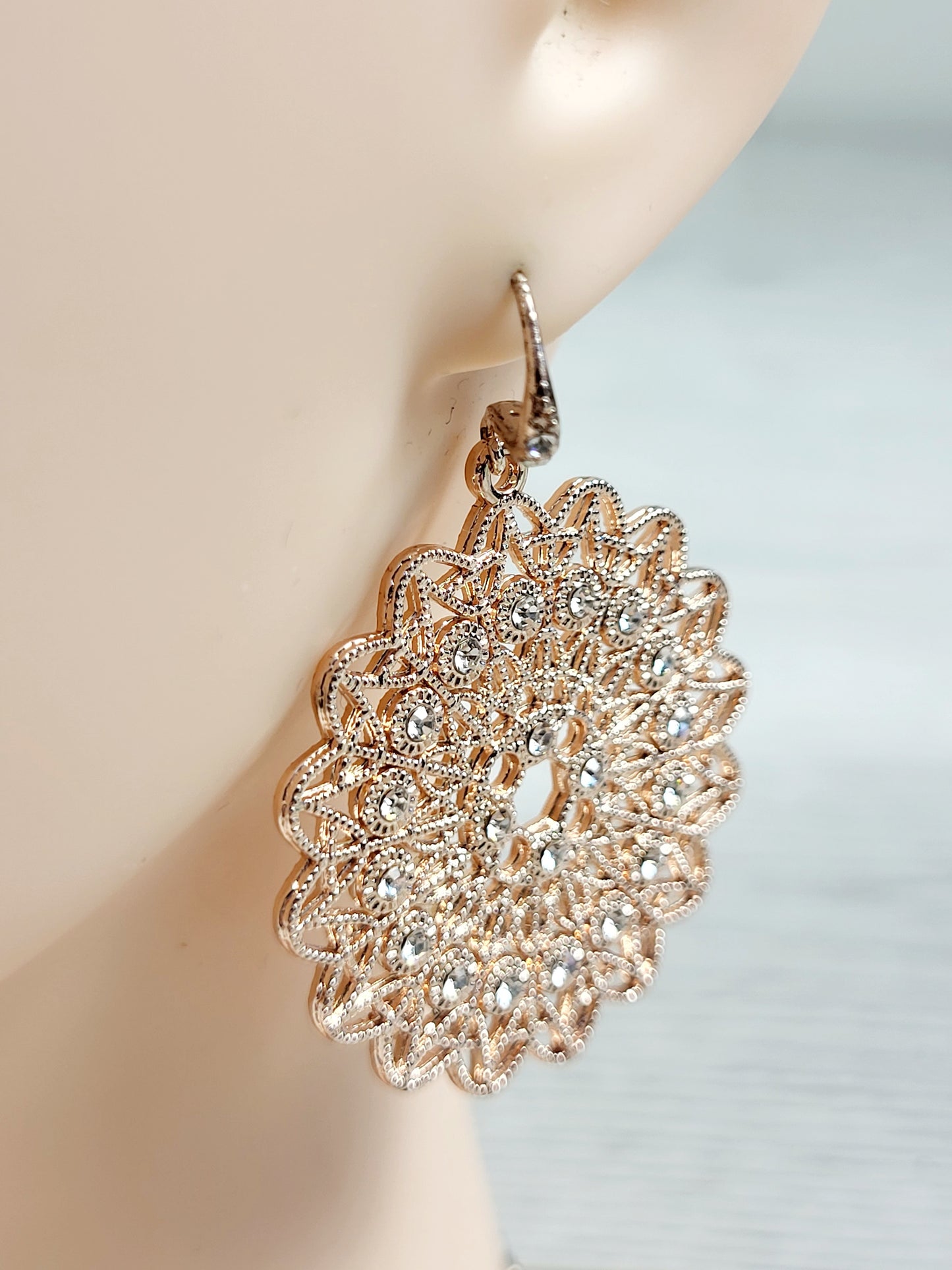 CHSP1 - I.N.C. rose gold toned crystal filigree jewelry set.