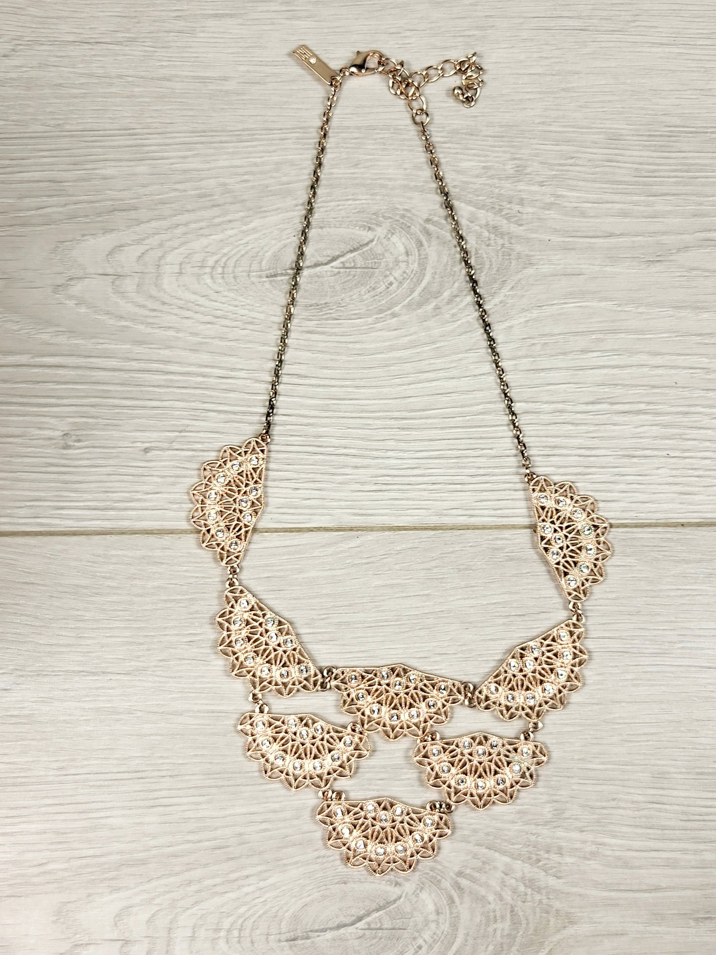 CHSP1 - I.N.C. rose gold toned crystal filigree jewelry set.