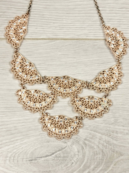 CHSP1 - I.N.C. rose gold toned crystal filigree jewelry set.