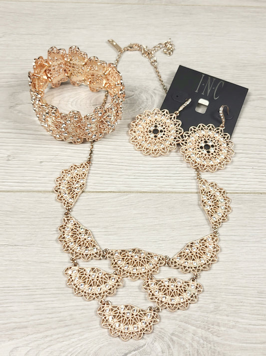 CHSP1 - I.N.C. rose gold toned crystal filigree jewelry set.