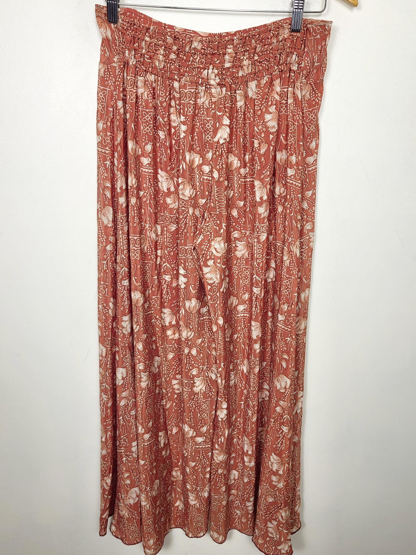 BRNA - Chai Fashions burnt orange floral patterned wide leg silk palazzo pants. Size medium