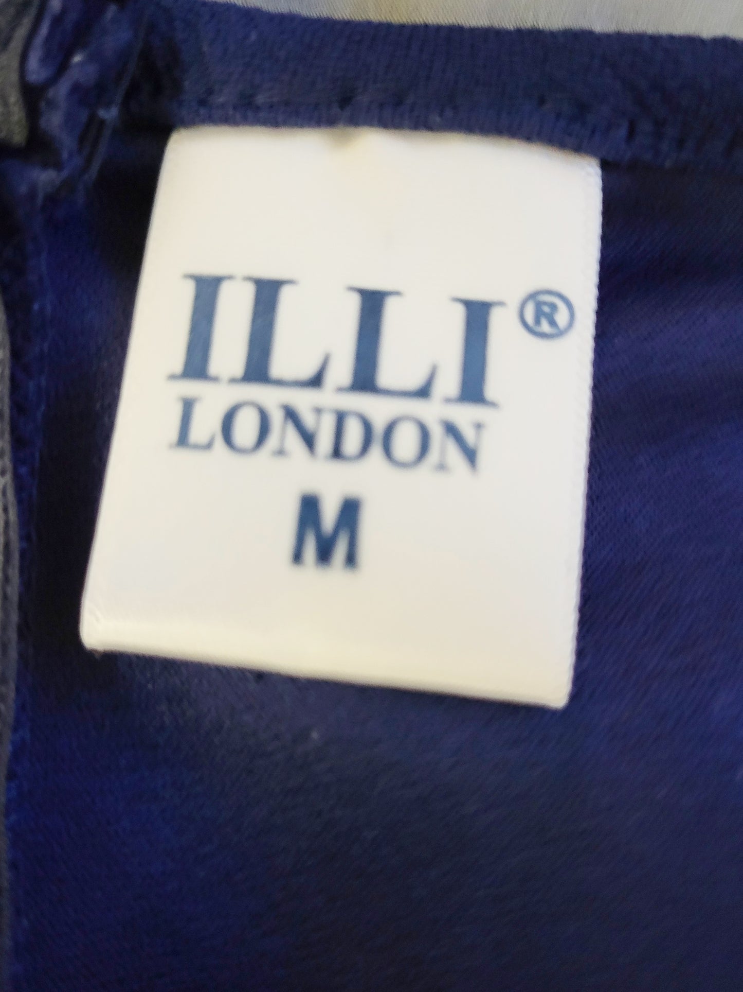 CHSP3 - Illi London navy puff sleeve peplum top. Size medium