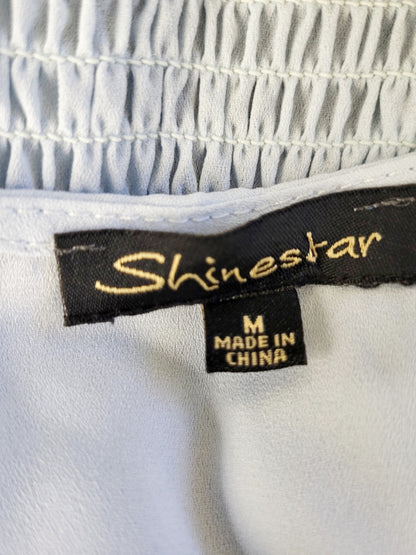 CHSP3 - Shinestar baby blue top. Size medium
