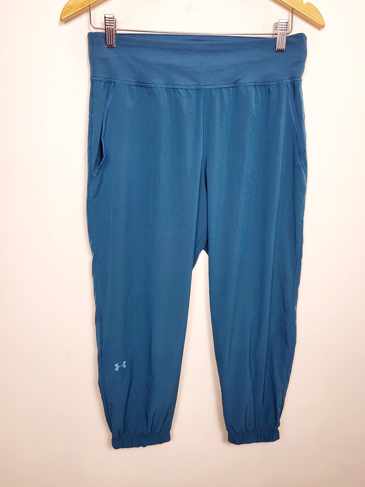 Under Armour teal cropped active joggers. Approx size small