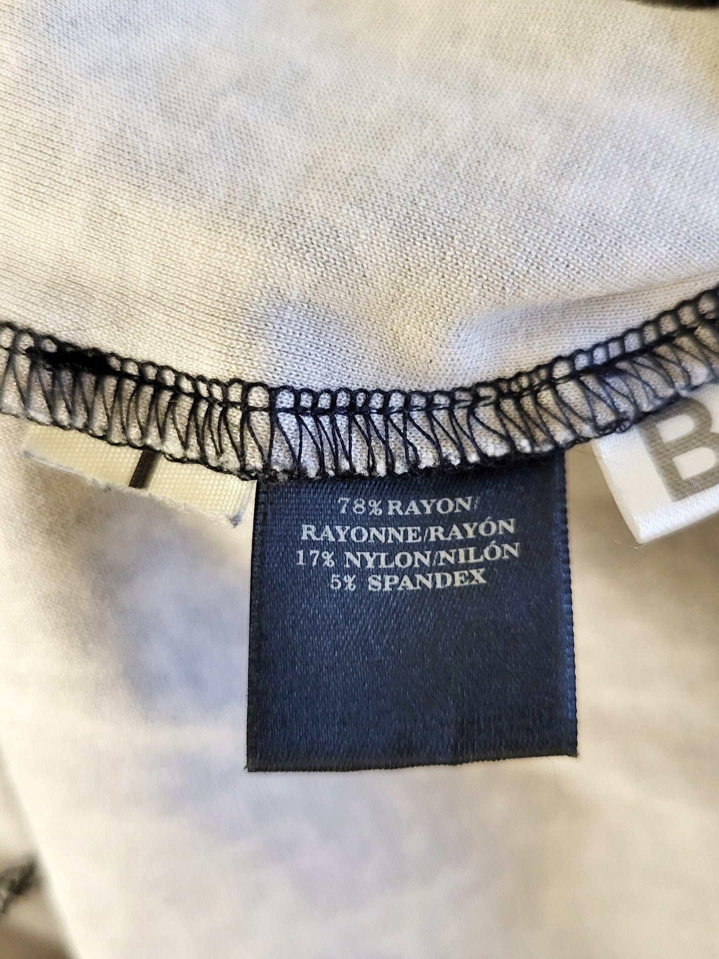 Ann Taylor black and white pencil skirt with ruffle hem. Size 12