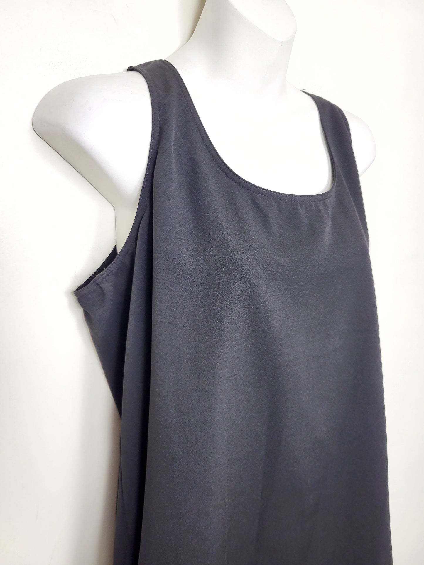 NEW - Ricki's black sleeveless pin tuck blouse. Size medium