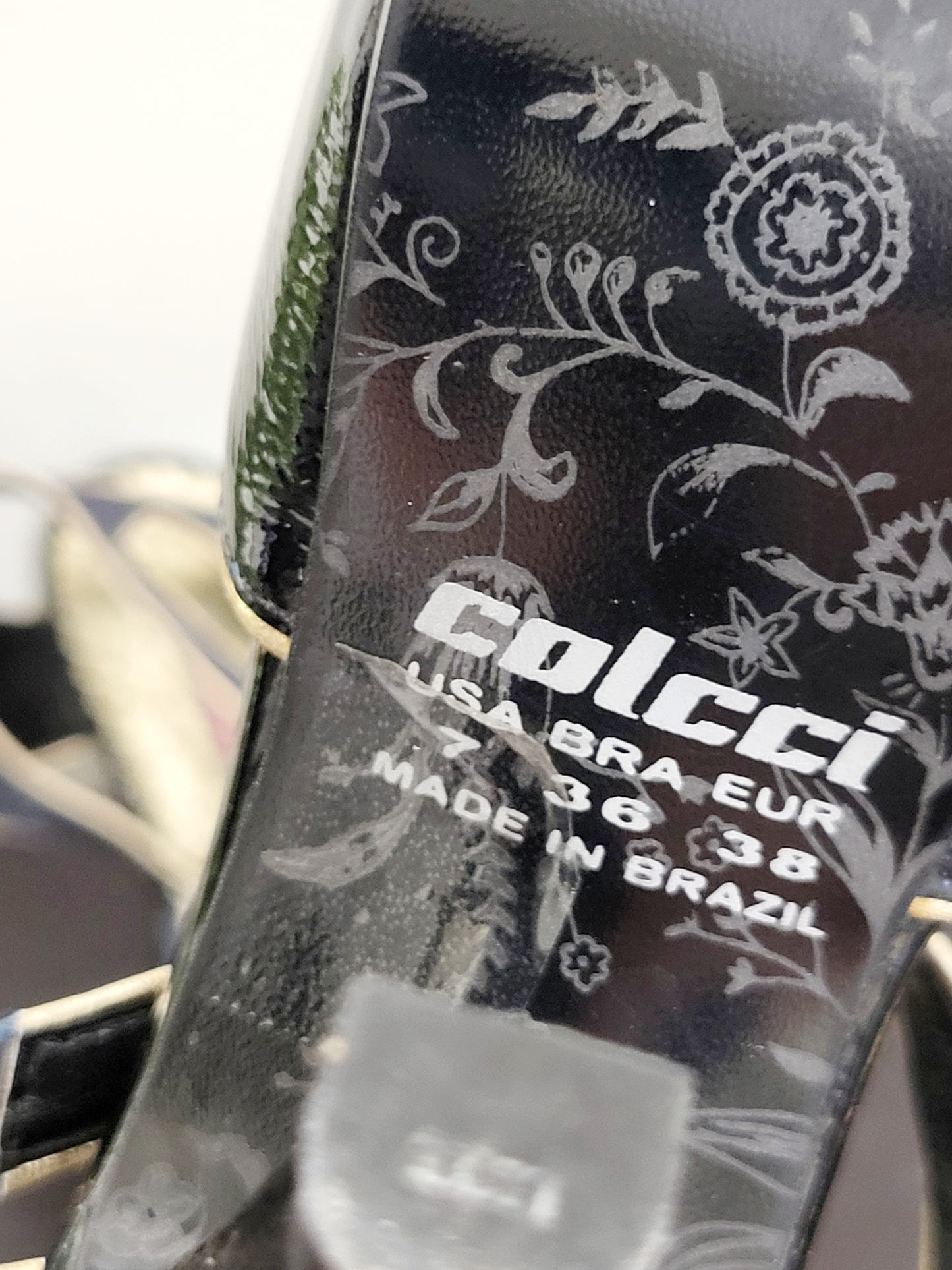 Colcci black and navy peep toe leather heels with gold trim. Size 7