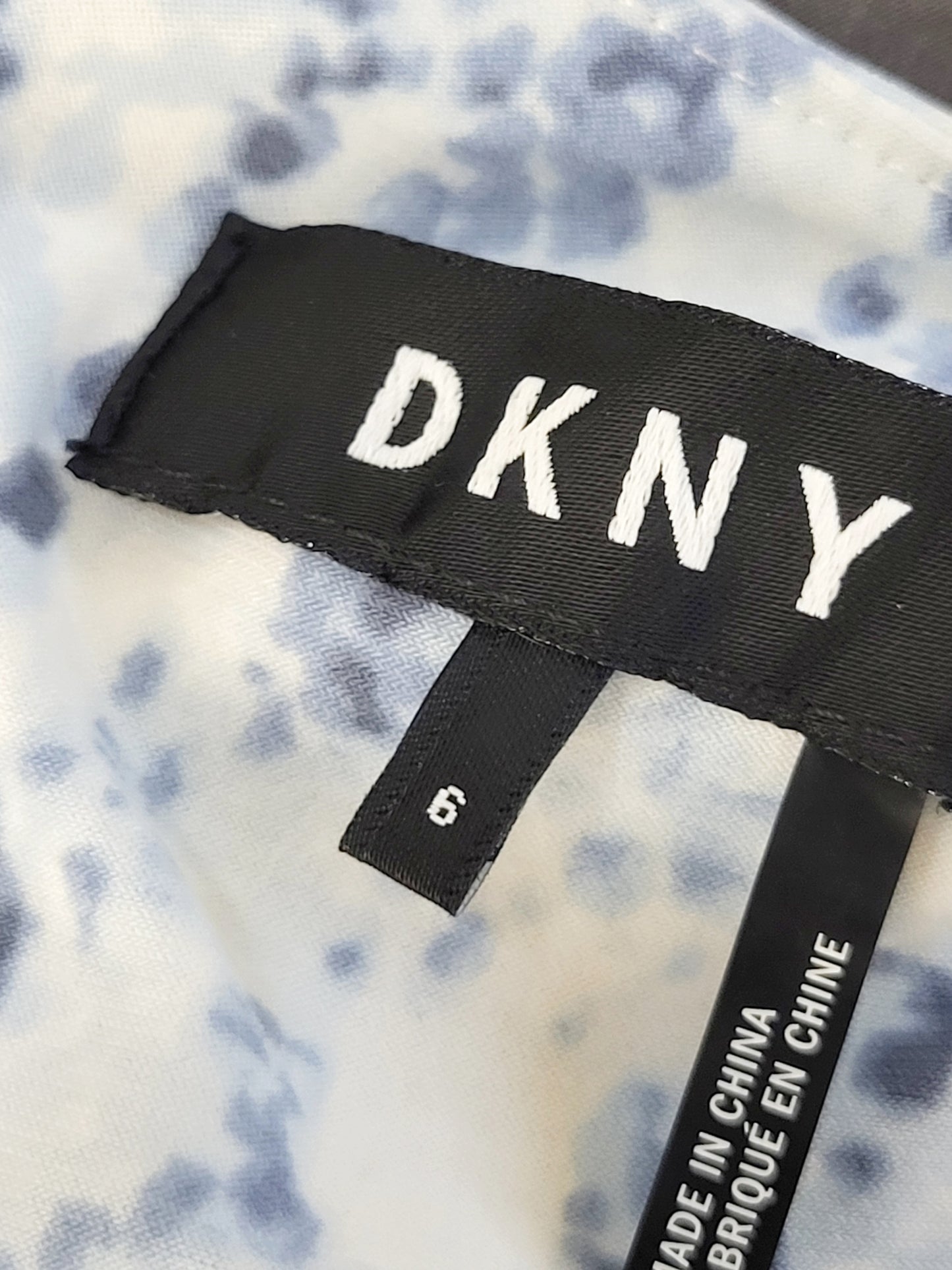 DKNY white and blue floral print ruched midi dress. Size small