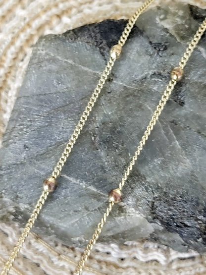 Gold toned and rhinestone necklace