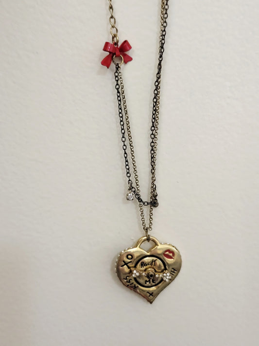 Betsey Johnson "Hugs and Kisses" heart necklace (arrow actually spins)