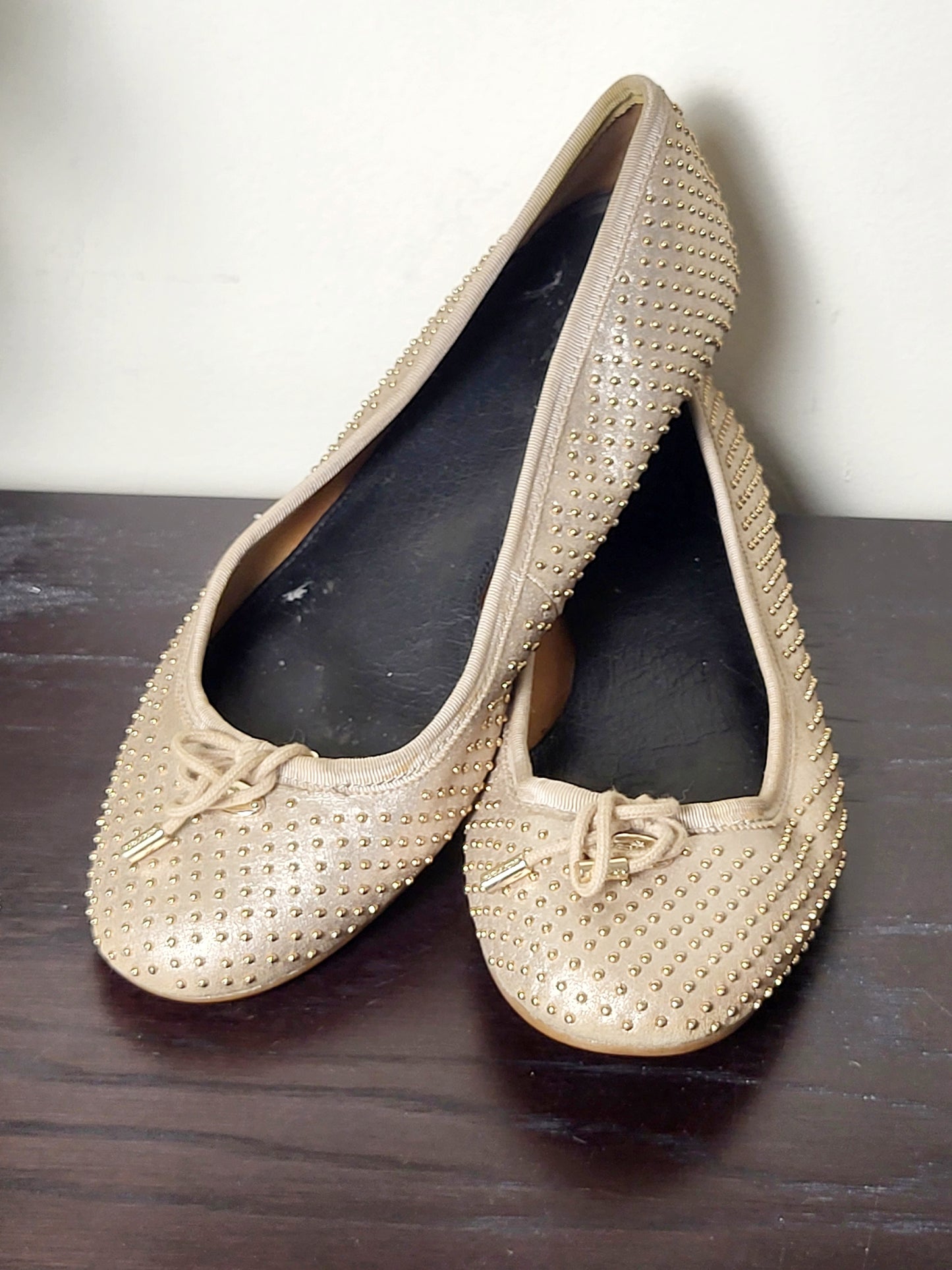 Coach Lara studded metallic ballet flats in a dull gold/nude colour. Size 39 (US size 8)