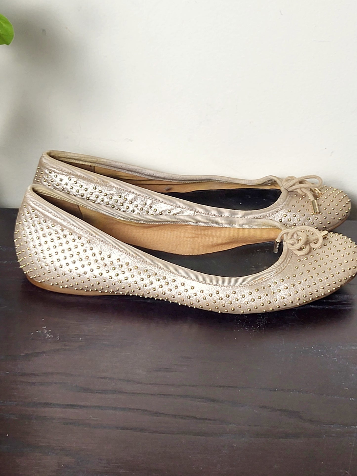Coach Lara studded metallic ballet flats in a dull gold/nude colour. Size 39 (US size 8)
