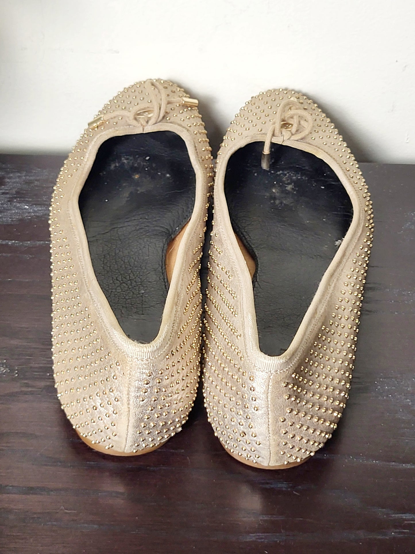 Coach Lara studded metallic ballet flats in a dull gold/nude colour. Size 39 (US size 8)