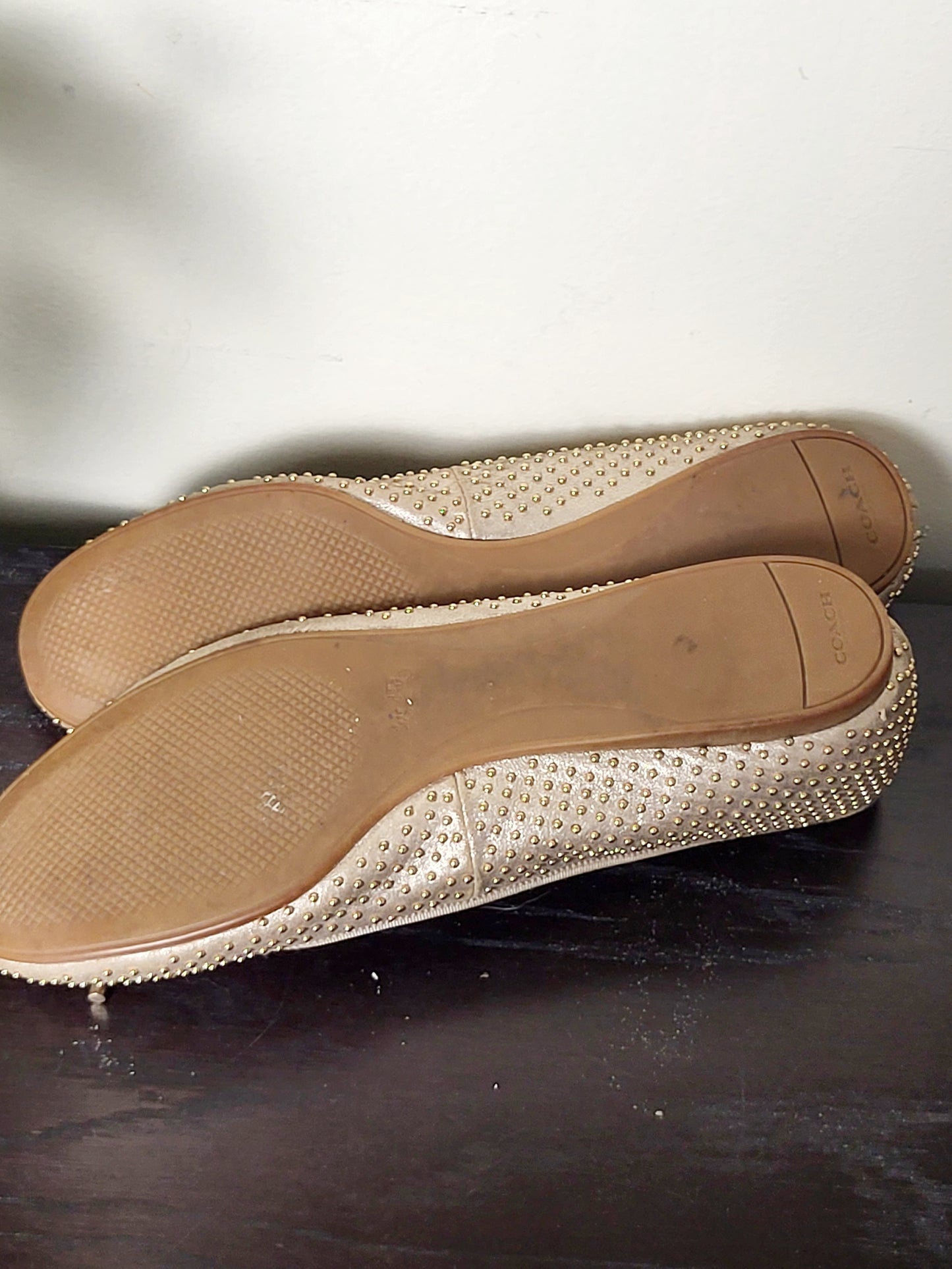 Coach Lara studded metallic ballet flats in a dull gold/nude colour. Size 39 (US size 8)