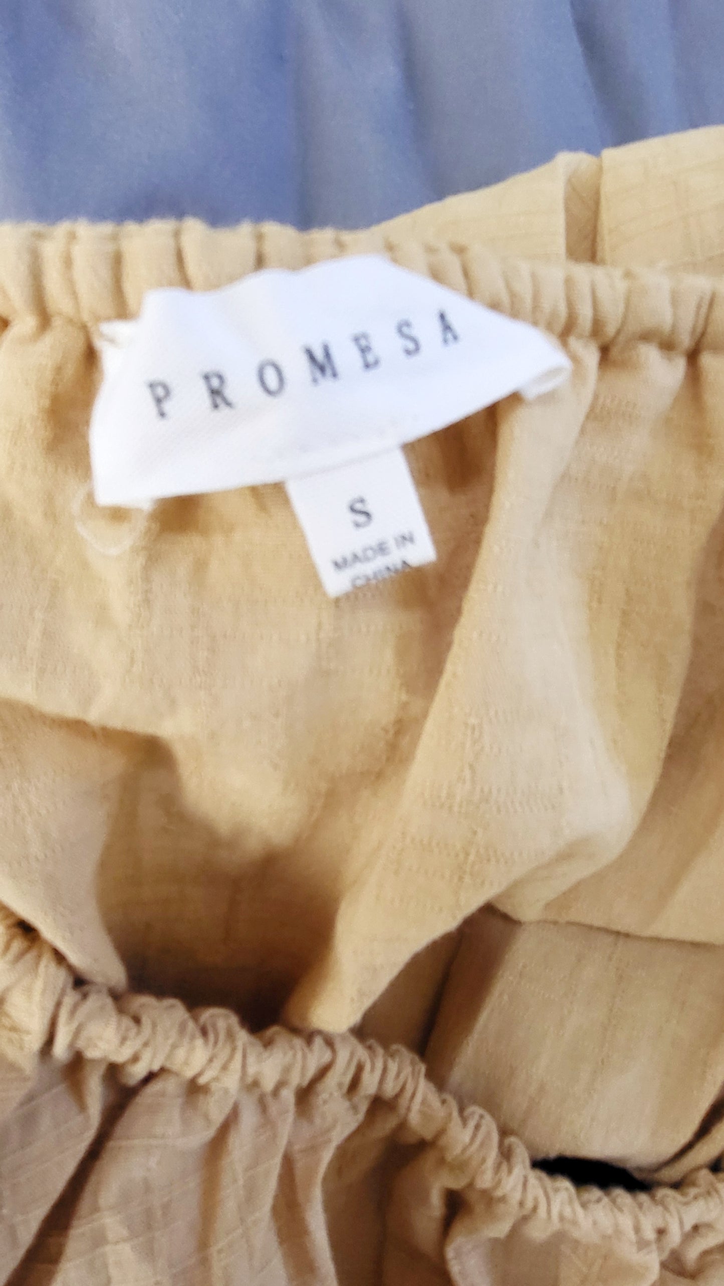 Promesa golden yellow off the shoulder ruffle romper. Size small