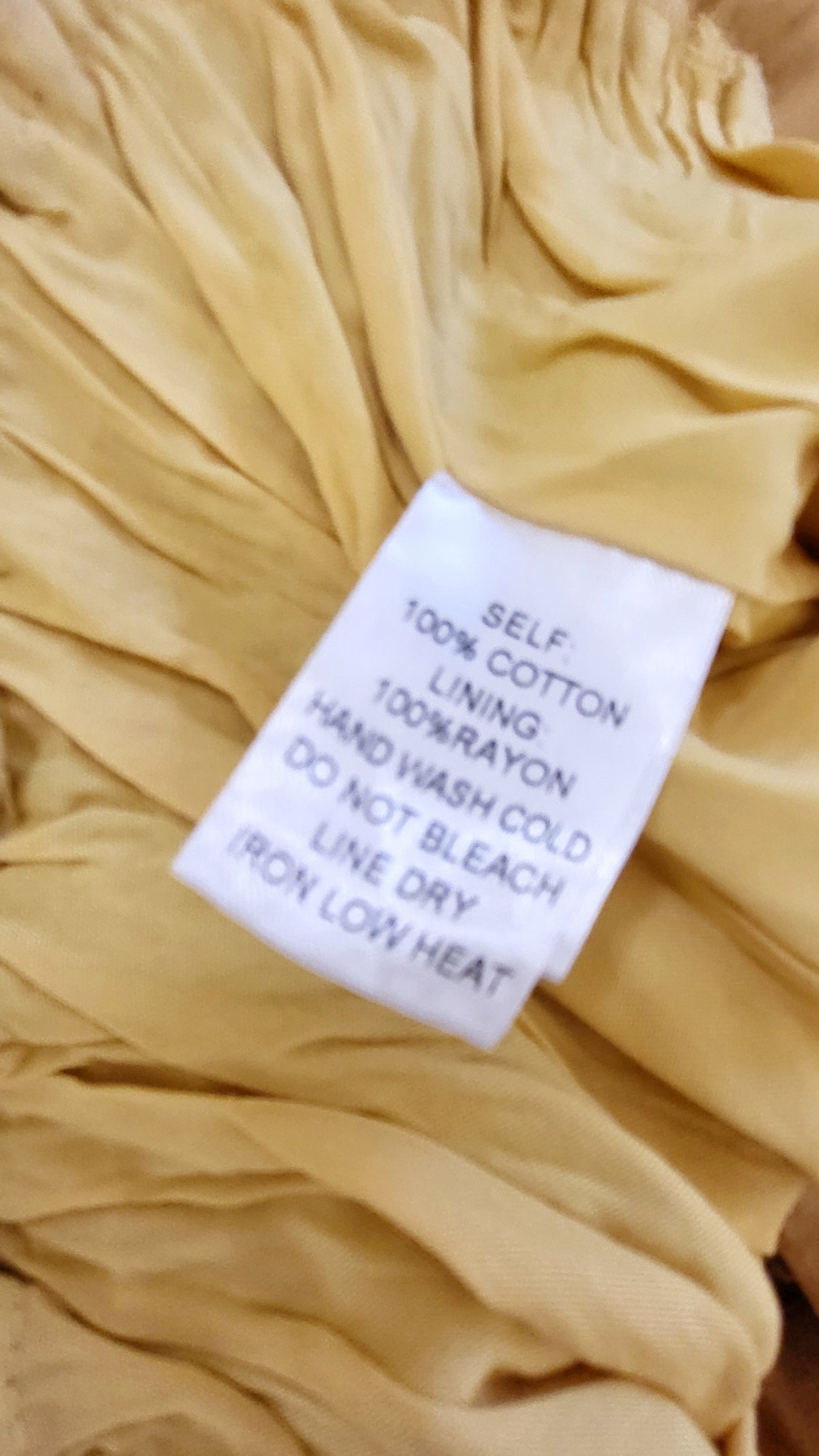 Promesa golden yellow off the shoulder ruffle romper. Size small