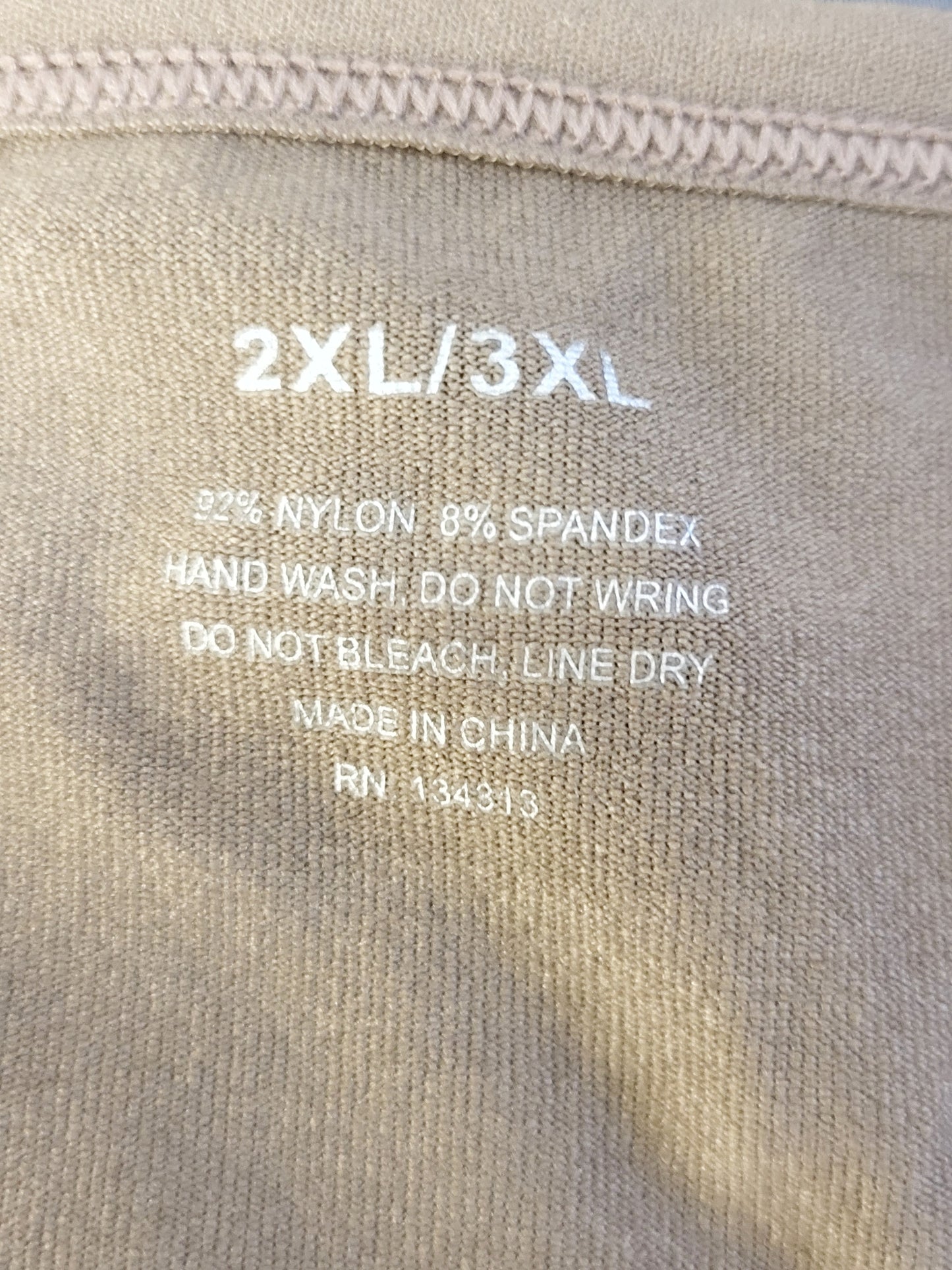 Sand coloured cut-out style bralette. Size 2/3X