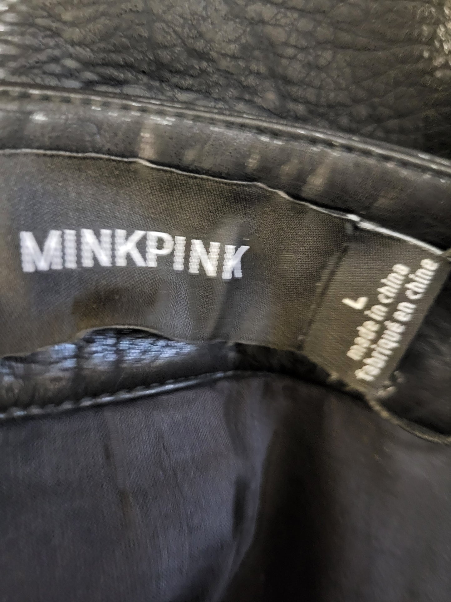 NEW - Minkpink black studded faux leather "Nikita" skirt. Size large (seems more like a medium)