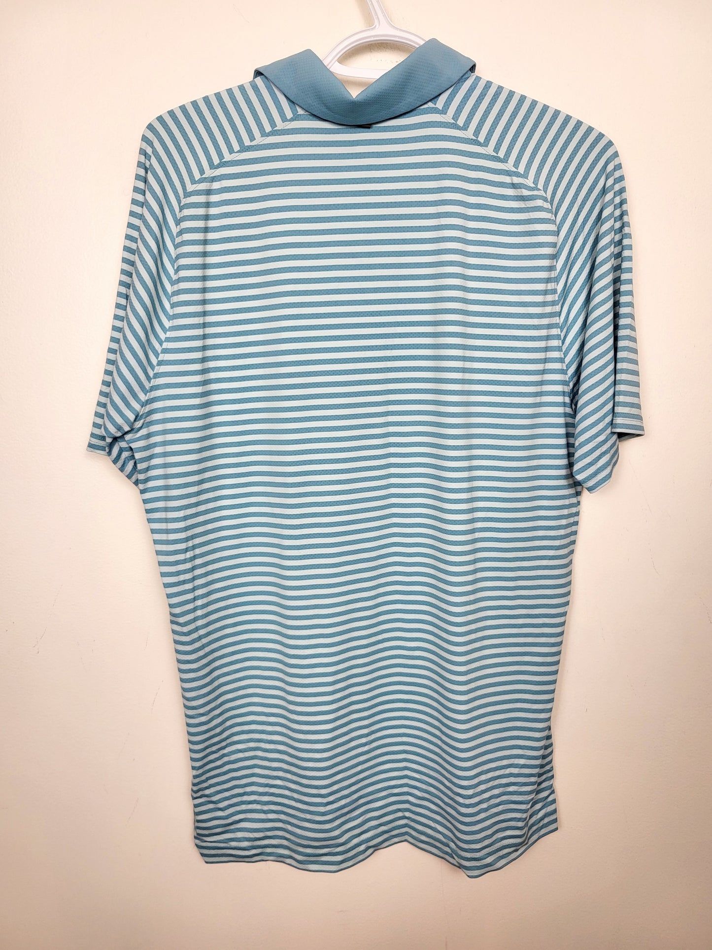 Under Armour blue striped loose fit Iso-Chill polo shirt. Size medium